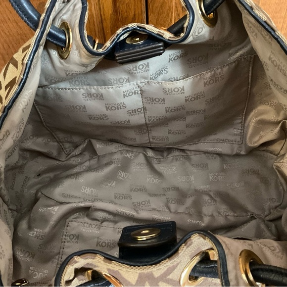 Michael Kor’s Signature Canvas East West Ring handle Handbag - Picture 7 of 7